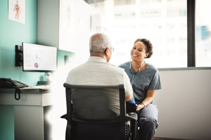 A doctor talking to a patient in medical clinic