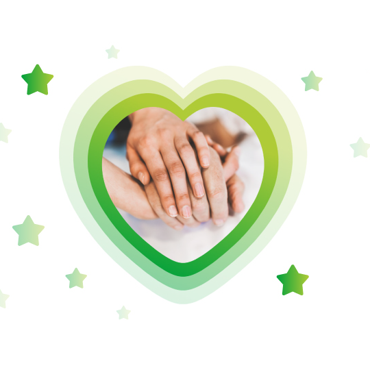 A green heart symbolizing health, cradled by two hands, representing unity and support in well-being.