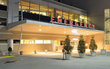 The exterior of an emergency room entrance at a hospital.