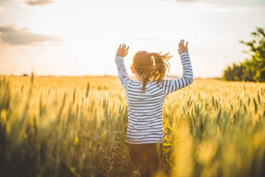 Child-Runs-Free-Through-A-Cornfield-having-fun