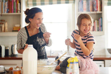 mother-and-daughter-baking-together-and-having-fun-despite-adhd-stresses